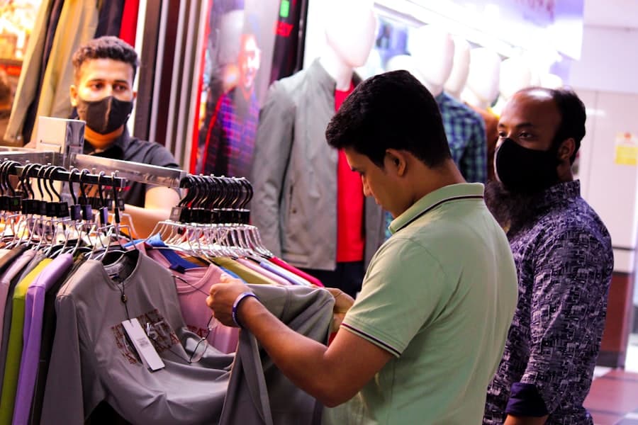 Customers browsing a clothing rail