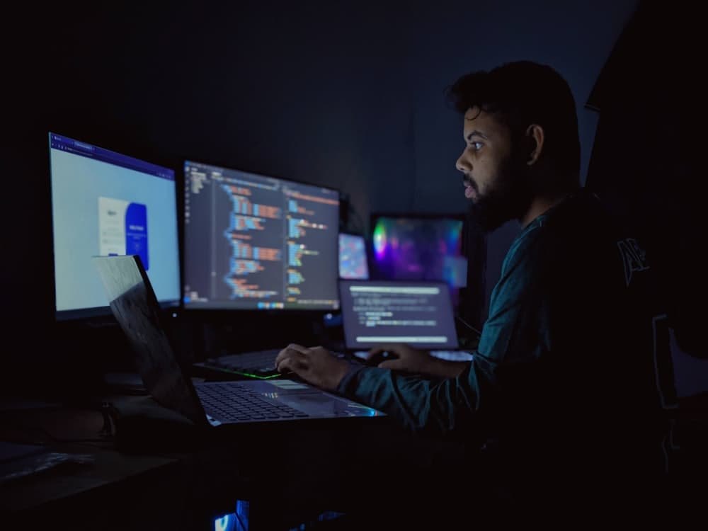 Operator watching a bank of monitors
