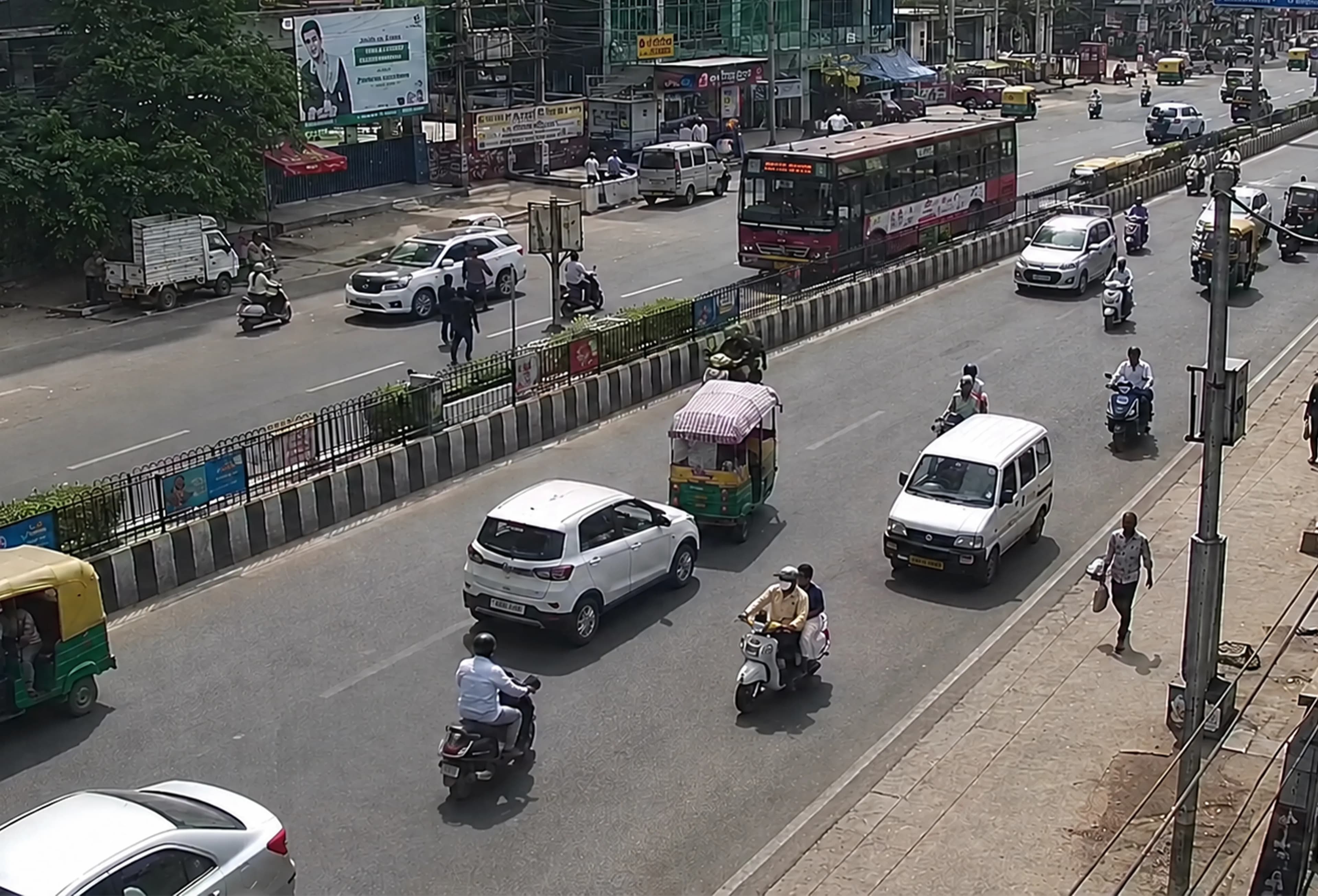 Untracked Street Traffic Cars, bikes and auto-rickshaws moving through busy street traffic without tracking