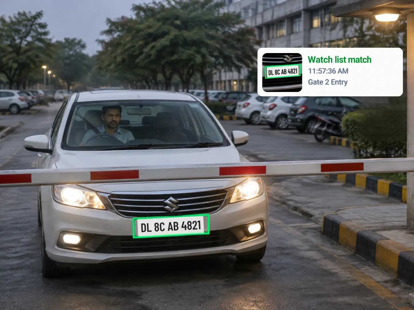 White car at a boom barrier with its number plate boxed in green and a watch list match alert on screen