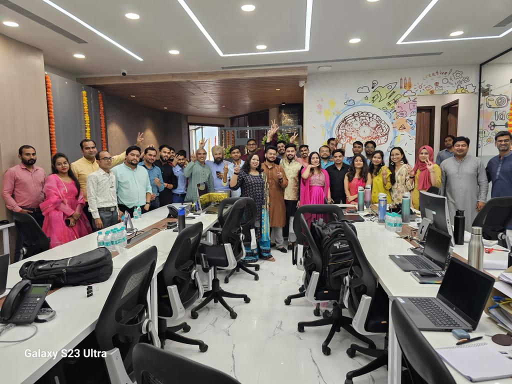Transline Technologies team members working together in the office