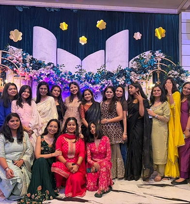 Group photo of women employees at an annual day celebration