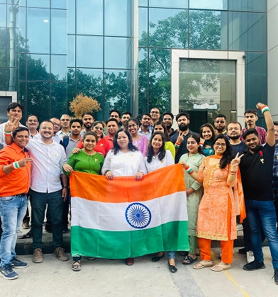 Transline team celebrating Independence Day with the national flag