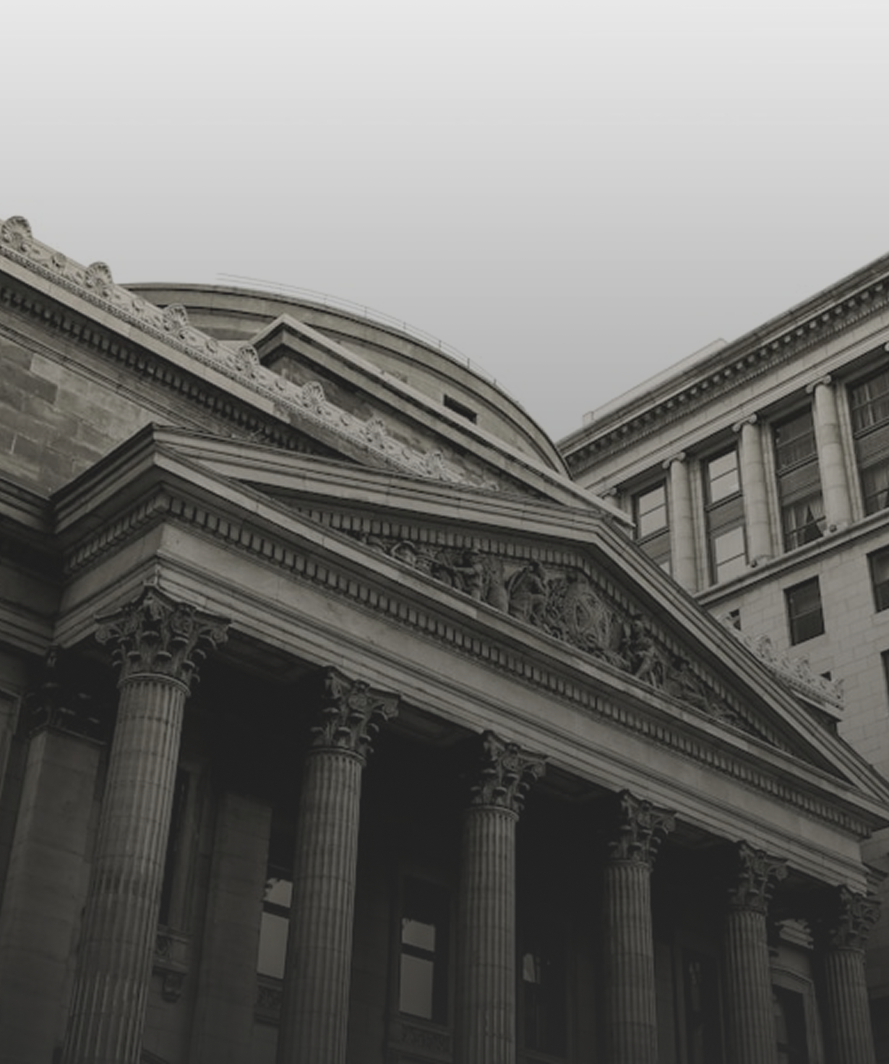 Security Solutions for Banks and Financial Institutions Classical bank building with stone columns representing banking and BFSI security solutions